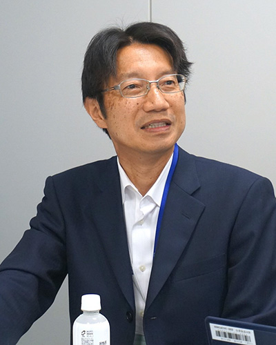 KDDI株式会社 小峰章仁氏